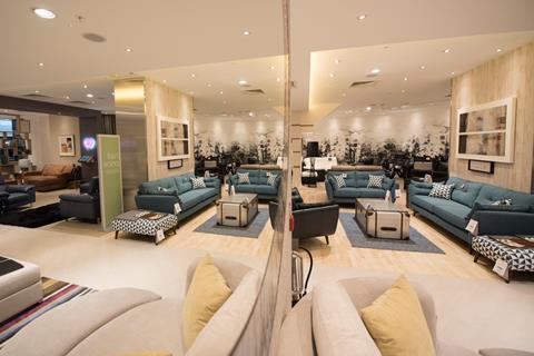 There is space for customers to try out sofas while store associates show them model, colour and material options